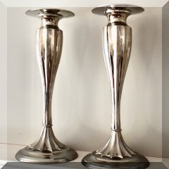 D32. Pair of tall metal Global Views candlesticks. 16”h - $85